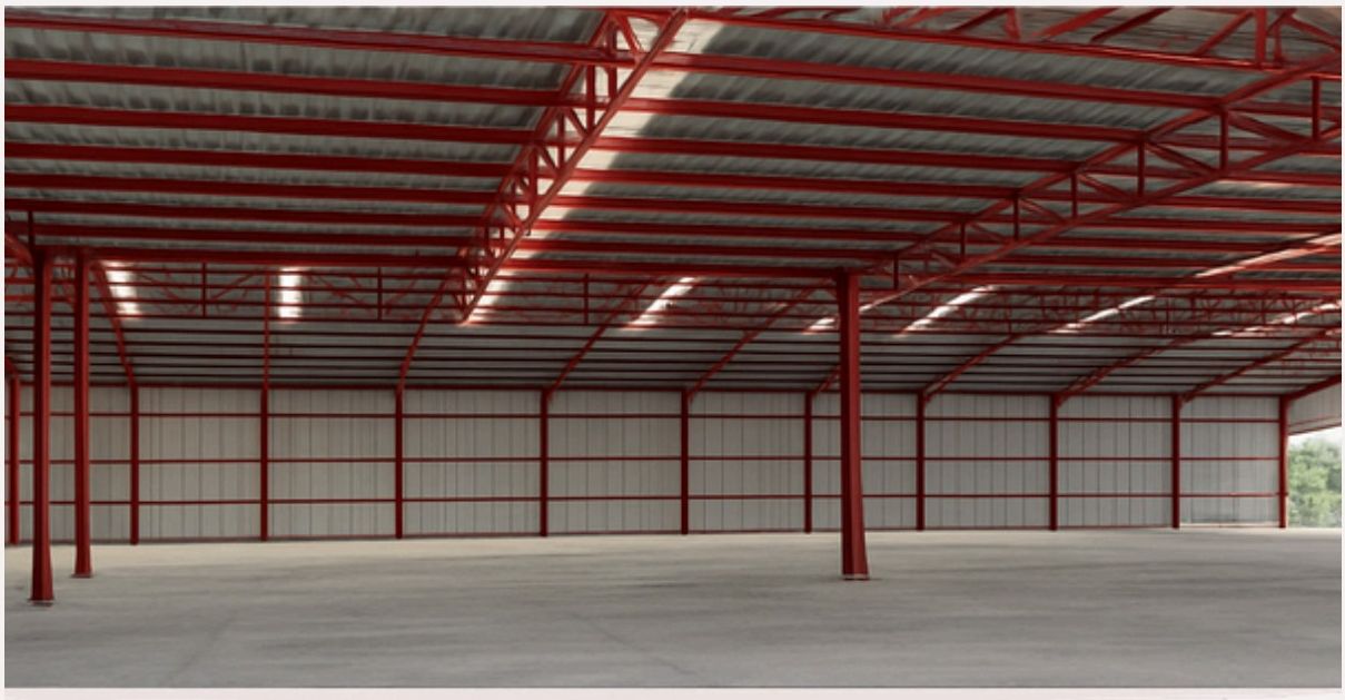 Almacén terminado con muro de tabique y estructura roja